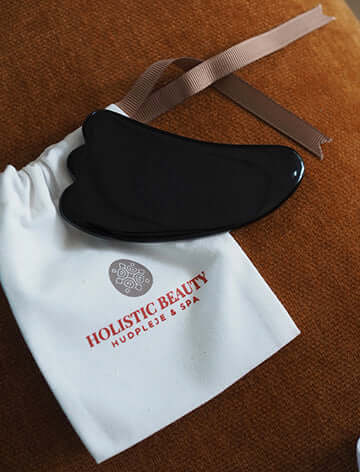 Sort Obsidian Gua Sha: Din Nye Skønhedsrutine Hjemmefra